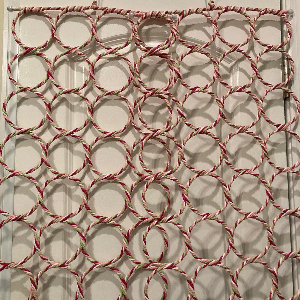 Scarf hangers with 28 holes in each hanger..  Set of 2.  New. $10 total.